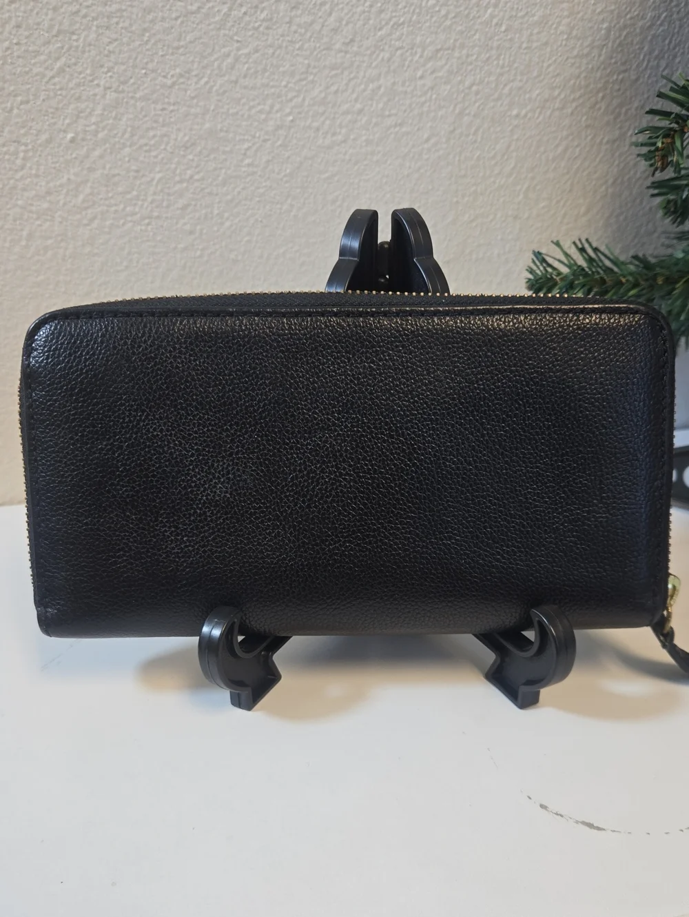 Fossil Black Leather Zip-Around Wallet with Gold Logo